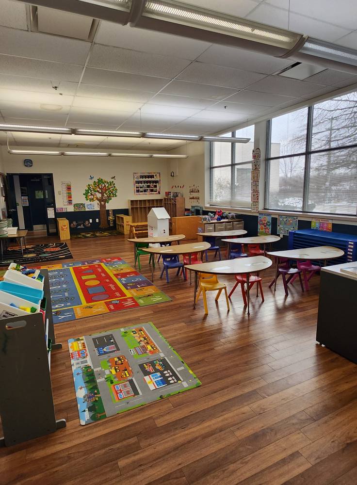 Preschool classroom at Della School of Coding & Design in southeastern Columbus, Ohio, serving children from 6 weeks to 5 years old. The space features age-appropriate learning centers, cozy infant areas, and hands-on materials that support early development, STEM exploration, and social-emotional learning.